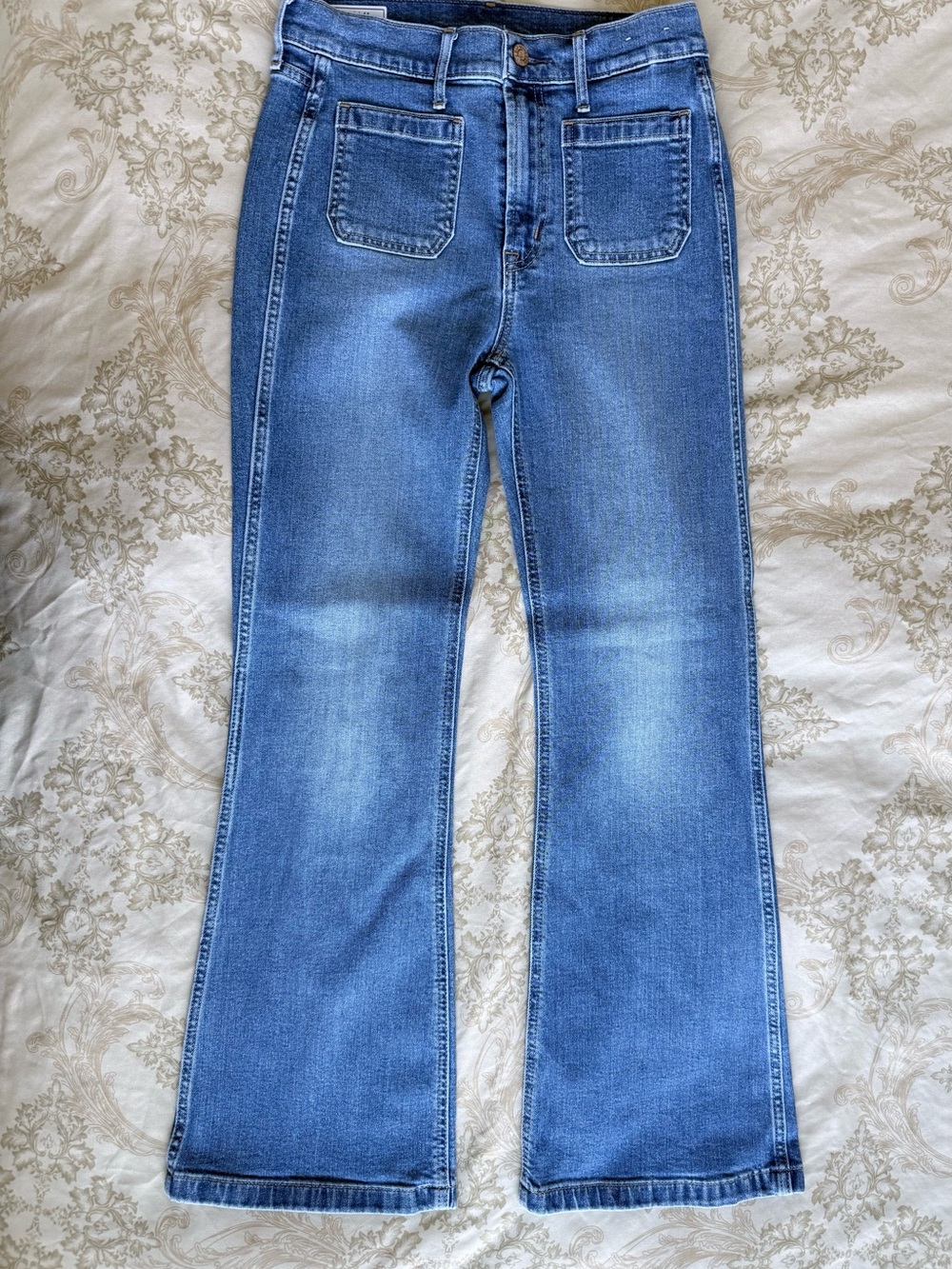 GAP 70’s Flare High Rise Jeans in Medium Indigo Wash
